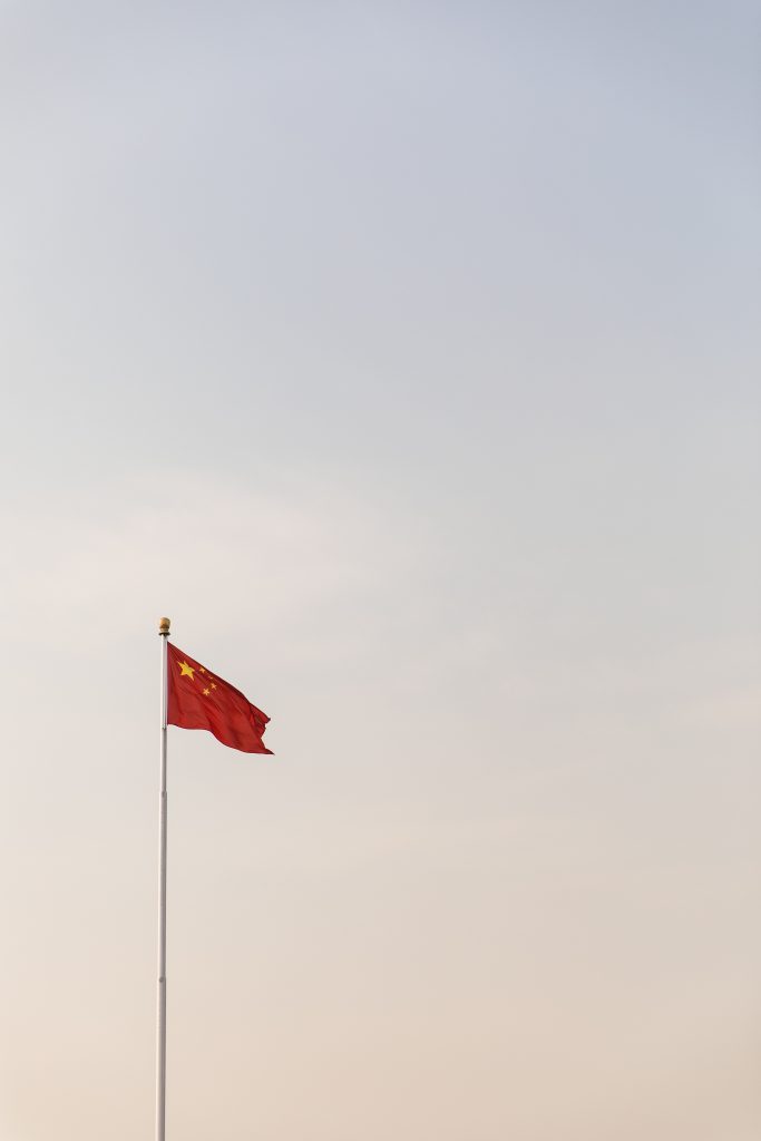 Chinese flag against sky
