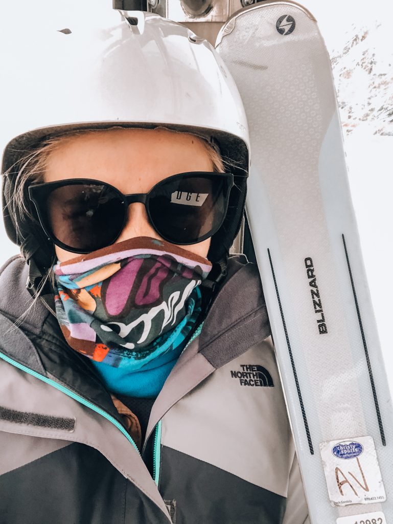 girl selfie with ski mask and skis
